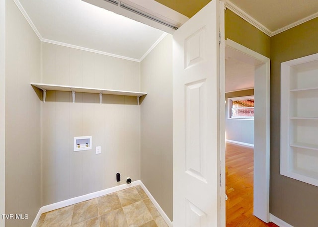 laundry room with crown molding, hookup for a washing machine, light wood-type flooring, and wood walls