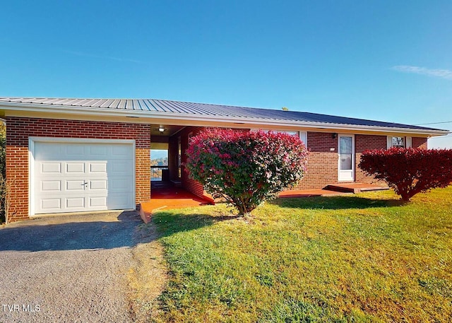 ranch-style house with a front lawn and a garage