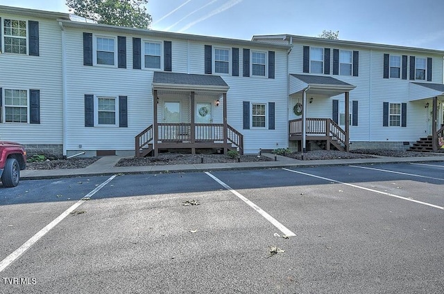 exterior space featuring uncovered parking and crawl space