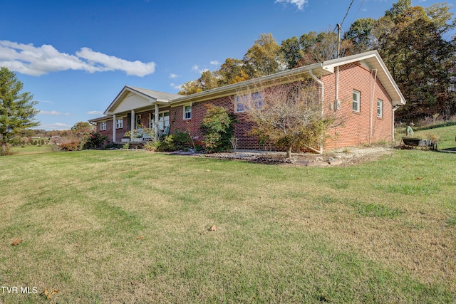 ranch-style house featuring a front lawn