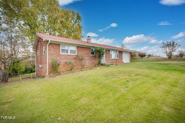 single story home with a front yard