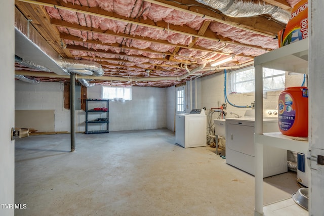 basement featuring washer and clothes dryer