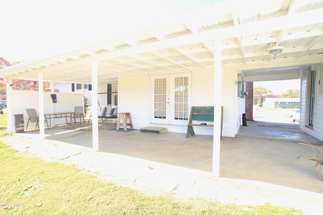 939 Muddy Creek Rd, Piney Flats, TN 37686 - view of patio / terrace featuring french doors and a carport