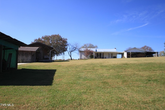939 Muddy Creek Rd, Piney Flats, TN 37686 - view of green lawn