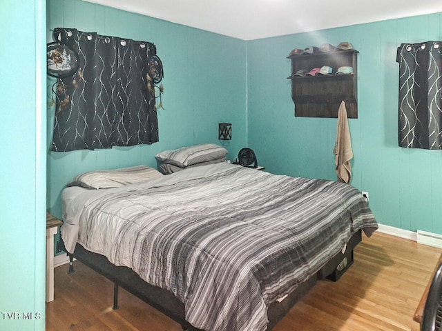 bedroom featuring hardwood / wood-style flooring