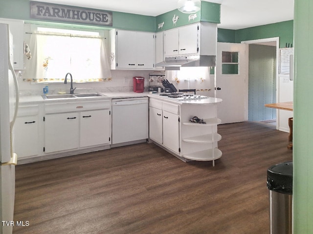 kitchen with dark wood-type flooring, white cabinetry, and white appliances