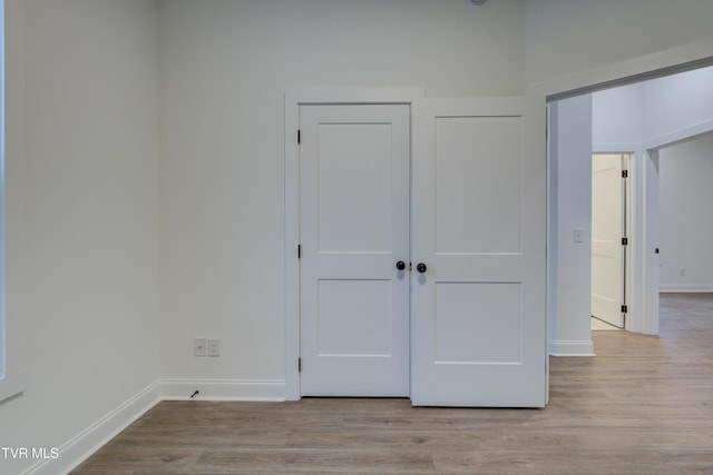 unfurnished bedroom with light hardwood / wood-style floors