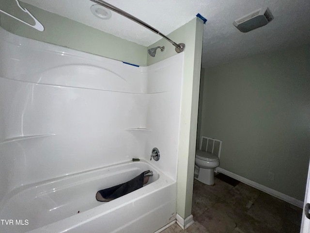 bathroom with toilet and shower / bath combination