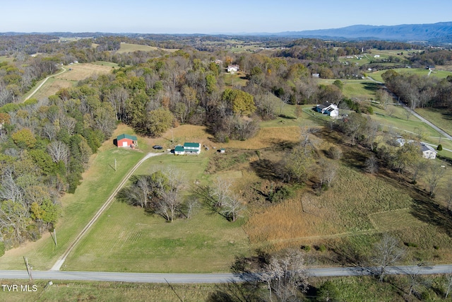 aerial view featuring a mountain view and a rural view