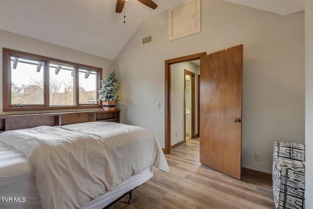 bedroom with light hardwood / wood-style flooring, lofted ceiling, and ceiling fan