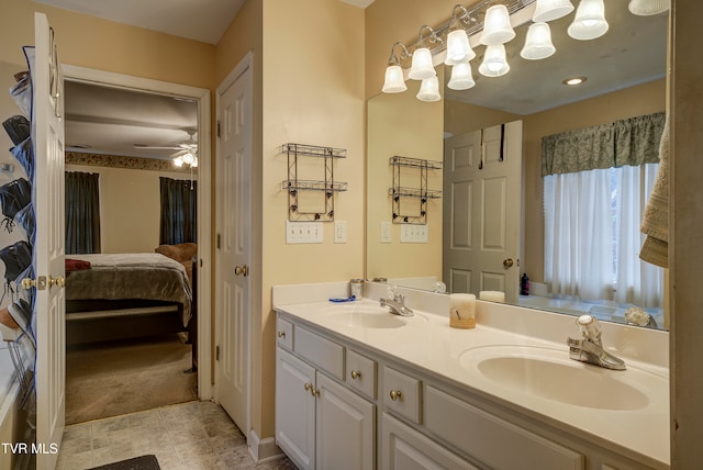 bathroom featuring vanity and ceiling fan