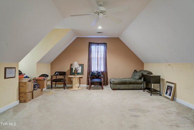 bonus room with lofted ceiling, light carpet, and ceiling fan