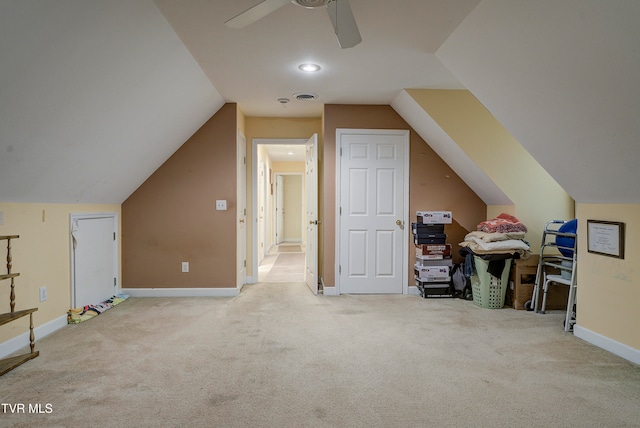 bonus room with carpet flooring, ceiling fan, and vaulted ceiling