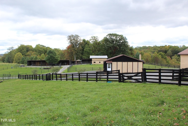 view of yard with a rural view