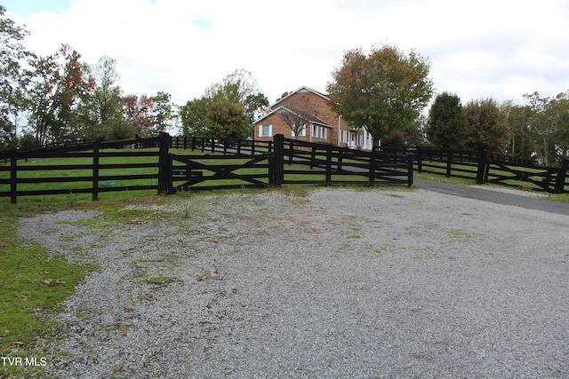 view of gate featuring a rural view