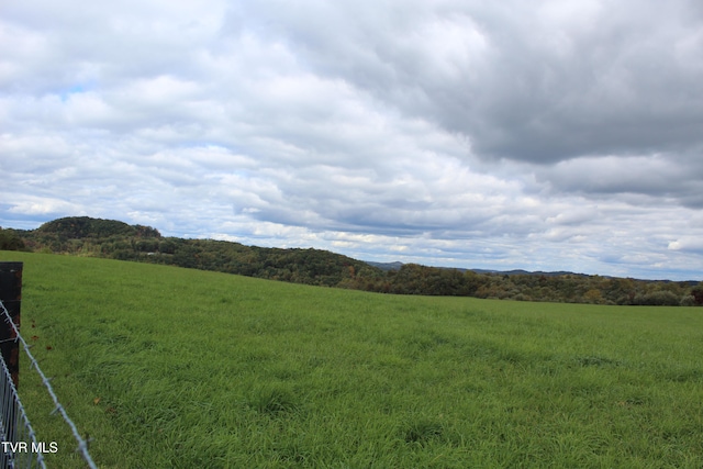 property view of mountains featuring a rural view