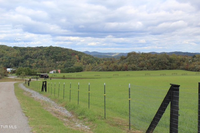 property view of mountains featuring a rural view