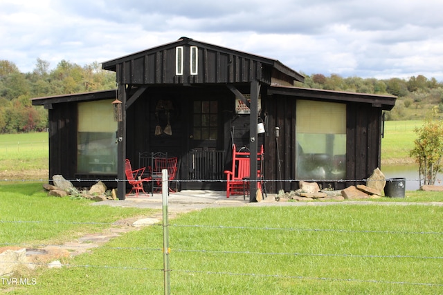 view of outdoor structure with a lawn