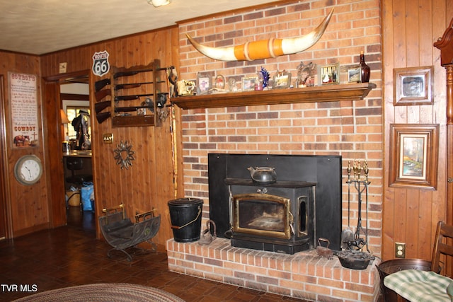 details featuring a fireplace and wooden walls