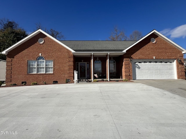 ranch-style home with a garage