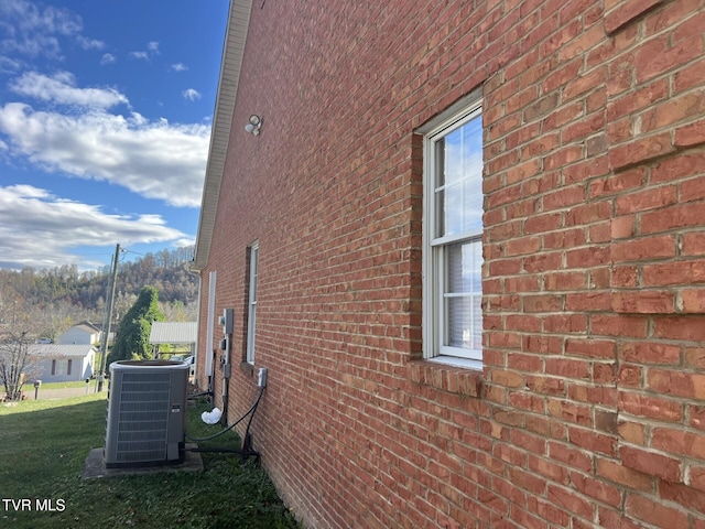 view of property exterior featuring central air condition unit