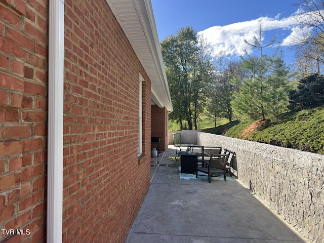 view of home's exterior featuring a patio