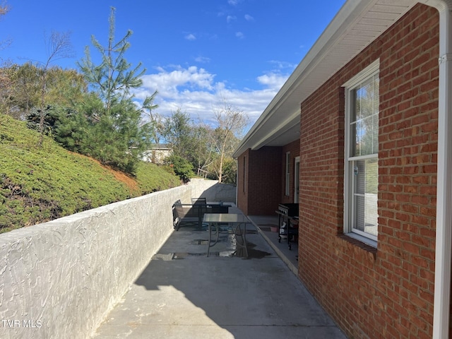 view of home's exterior with a patio area