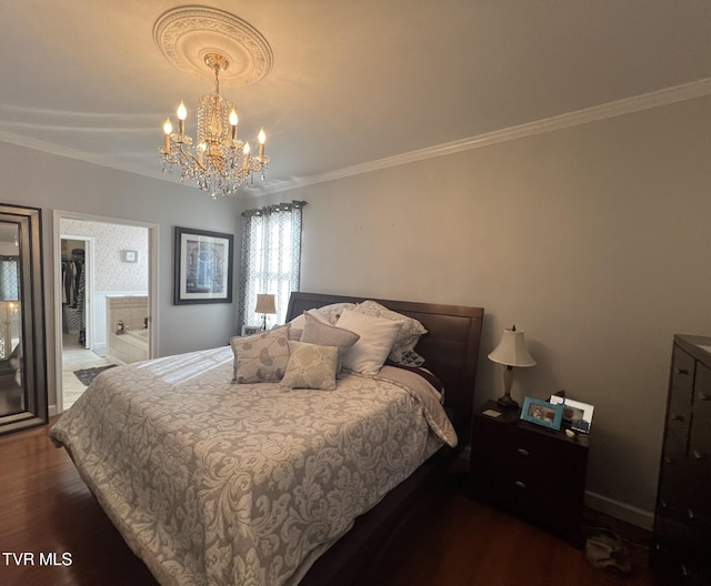 bedroom featuring dark hardwood / wood-style floors, ensuite bath, an inviting chandelier, and crown molding