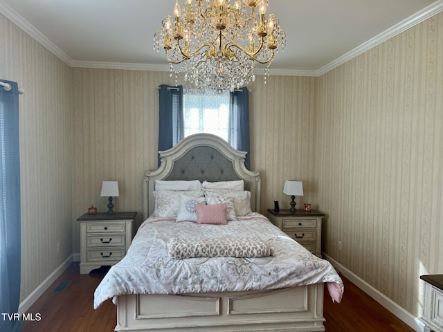 bedroom with dark hardwood / wood-style flooring, a notable chandelier, and crown molding