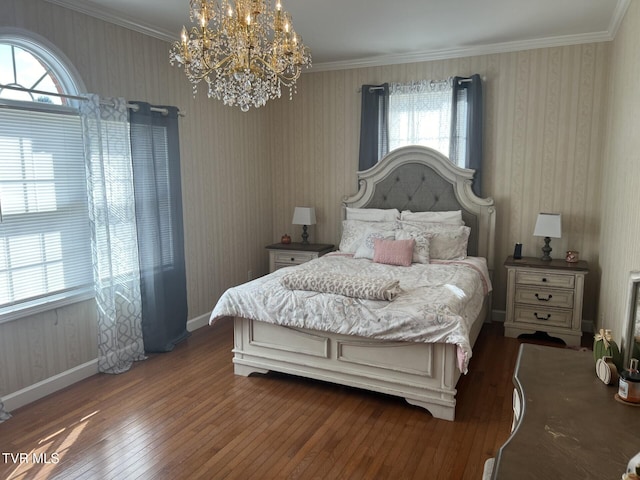 bedroom featuring wood-type flooring, multiple windows, and crown molding