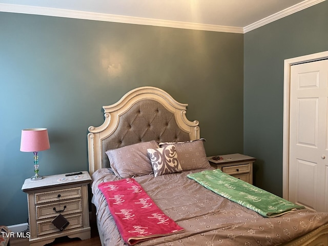 bedroom with crown molding