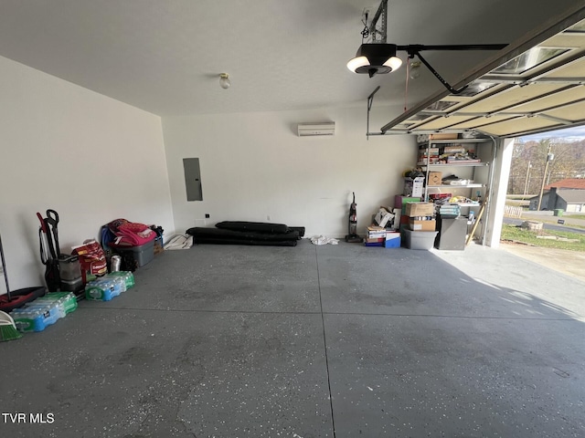 garage featuring a garage door opener, electric panel, and a wall mounted air conditioner