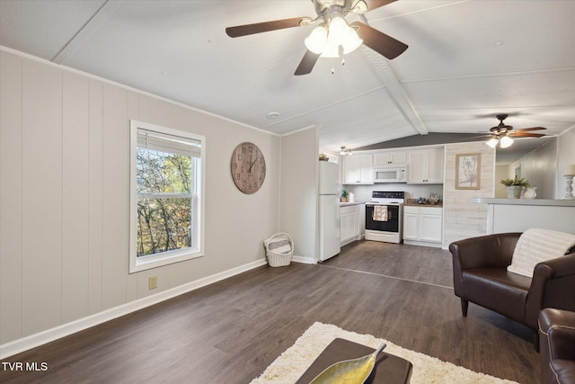 living room with dark wood-type flooring, lofted ceiling, wooden walls, ceiling fan, and crown molding