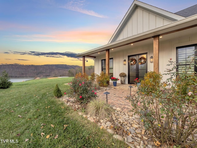 175 Deer Ridge Ct, Butler, TN 37640 - view of front facade with a front lawn and board and batten siding