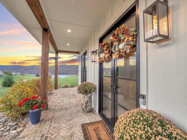 175 Deer Ridge Ct, Butler, TN 37640 - view of patio / terrace with a water view and french doors