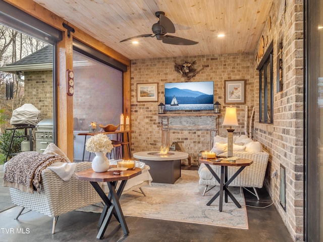 175 Deer Ridge Ct, Butler, TN 37640 - living room with brick wall, concrete flooring, ceiling fan, and wooden ceiling