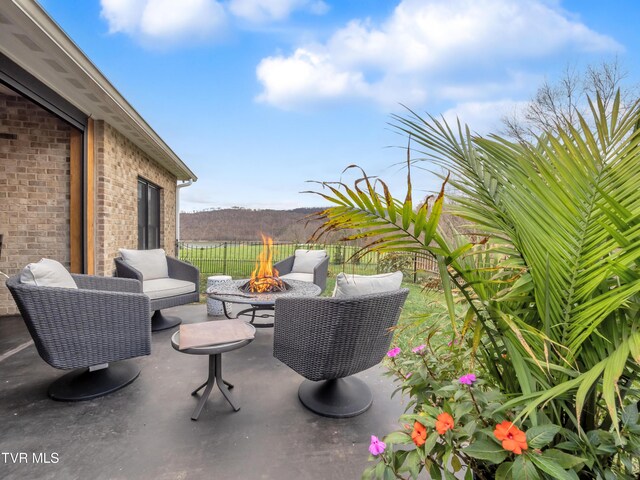 175 Deer Ridge Ct, Butler, TN 37640 - view of patio featuring a fire pit