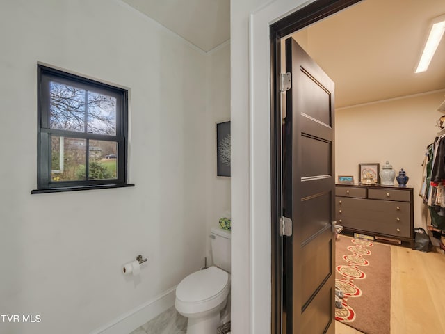 175 Deer Ridge Ct, Butler, TN 37640 - bathroom featuring toilet, baseboards, and marble finish flooring