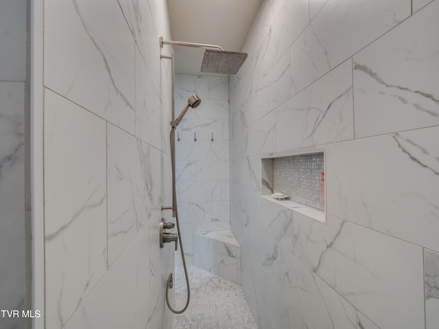 bathroom featuring tiled shower