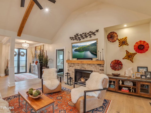 175 Deer Ridge Ct, Butler, TN 37640 - living area featuring wood finished floors, high vaulted ceiling, a brick fireplace, recessed lighting, and a ceiling fan