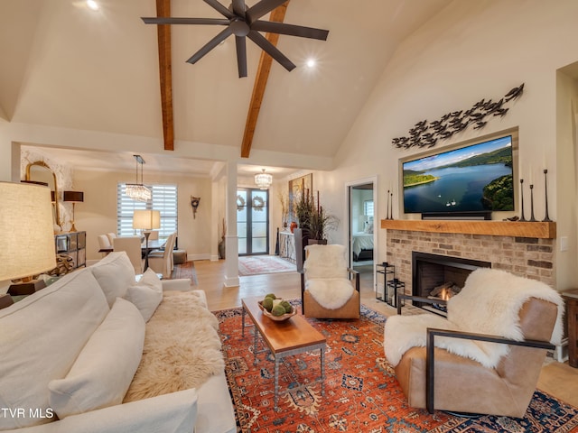 175 Deer Ridge Ct, Butler, TN 37640 - living room with ceiling fan, high vaulted ceiling, a brick fireplace, beam ceiling, and baseboards