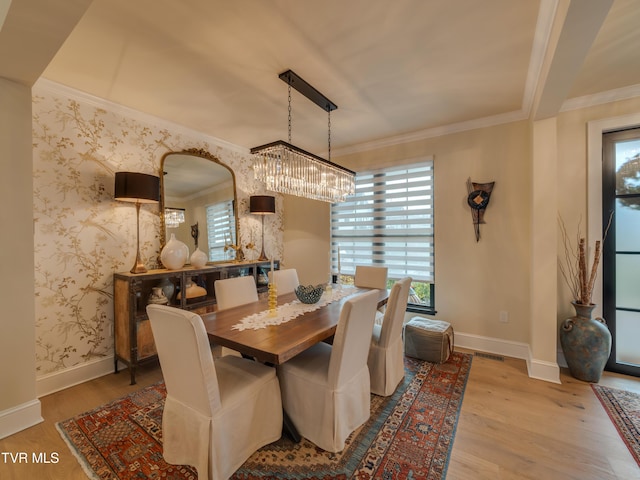 175 Deer Ridge Ct, Butler, TN 37640 - dining area featuring wood finished floors, a chandelier, baseboards, and ornamental molding