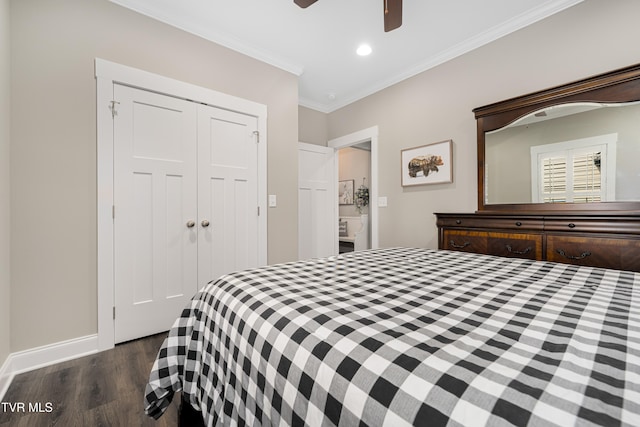 bedroom with ornamental molding, dark hardwood / wood-style flooring, ceiling fan, and a closet