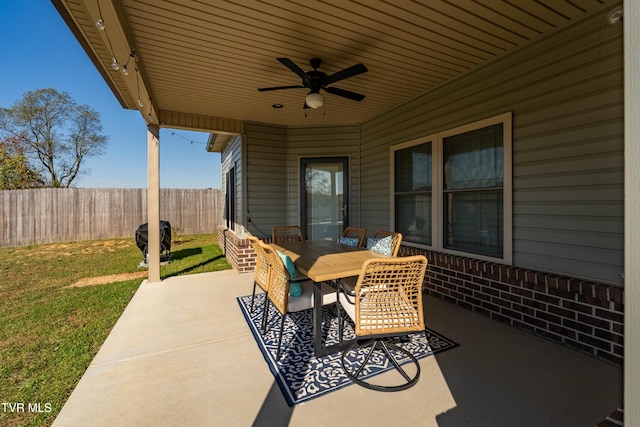 view of patio featuring ceiling fan