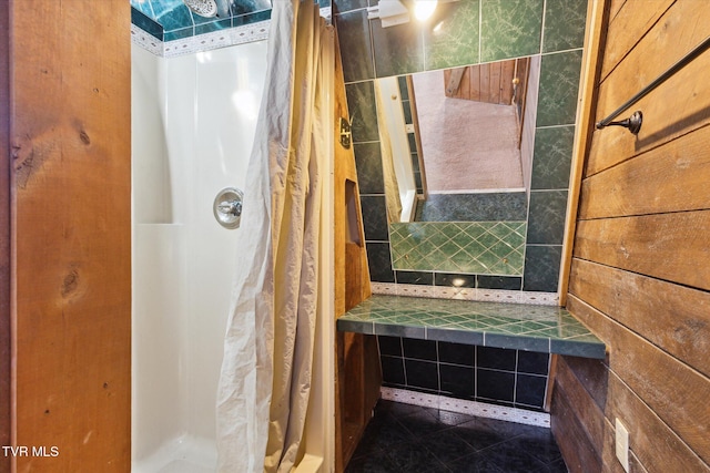 bathroom with a shower with curtain