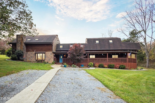 front facade with a front yard