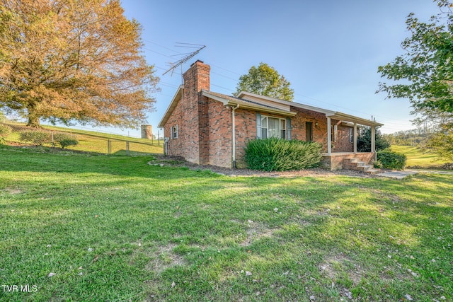 exterior space featuring a front lawn