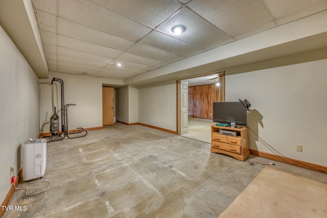 basement featuring a drop ceiling