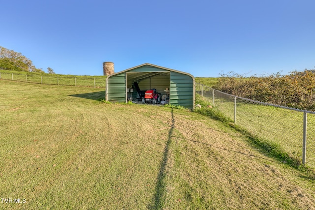 exterior space with a rural view and a carport