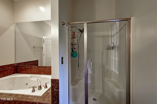 bathroom featuring plus walk in shower